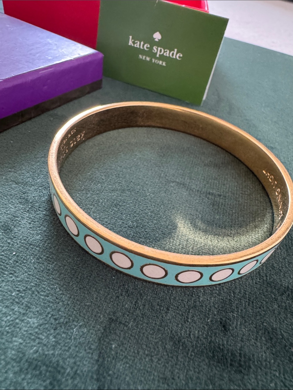 kate spade aqua enamel bangle bracelet with white dots and gold trim